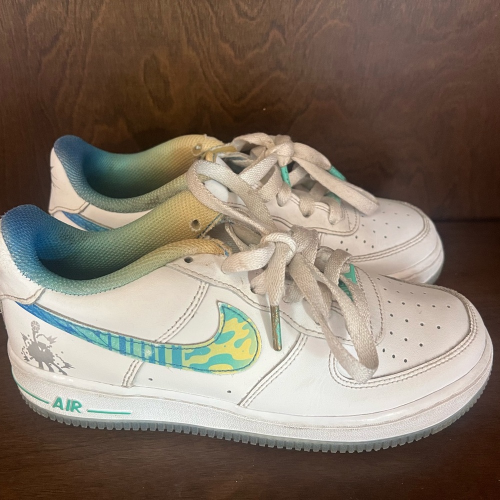 Nike Air Force 1 White Sneakers with Blue and Yellow Accents